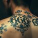 Bedeutung von 666 Tattoo: Symbolik und Mythen 8 666 tattoo bedeutung