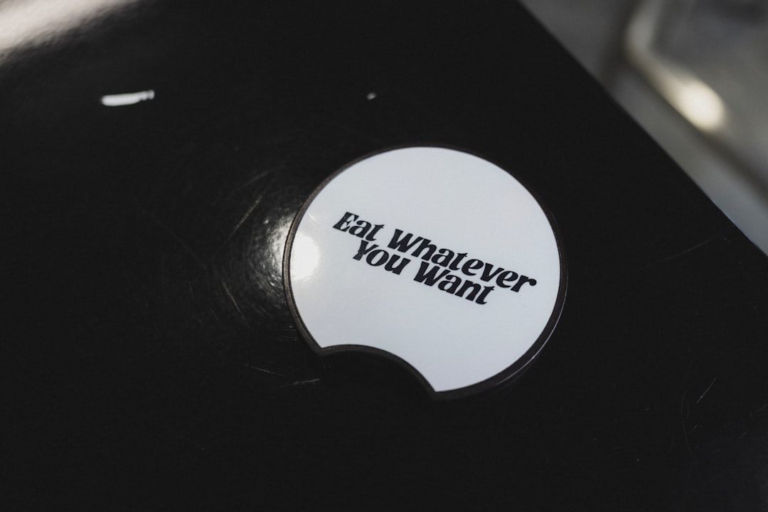White coaster with text "eat whatever you want"